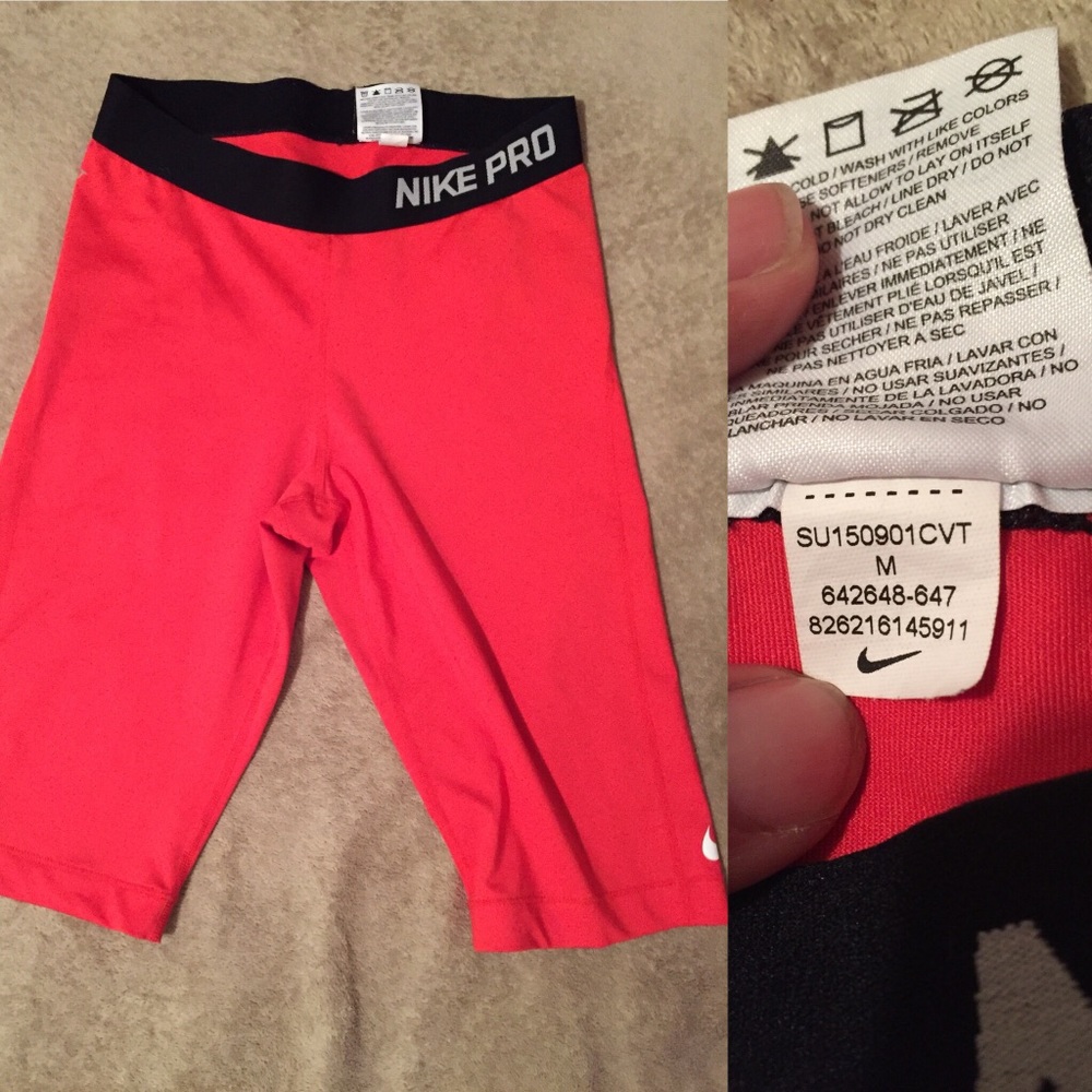 Red Nike Pro knee length shorts